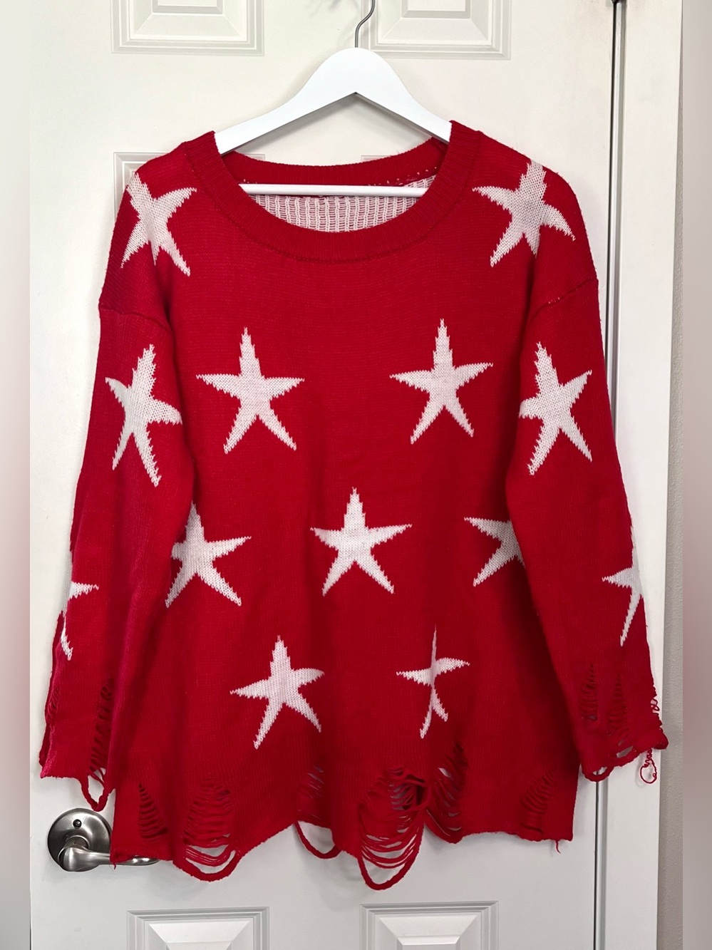 Seeing Stars Distressed Knit Sweater